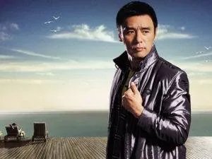 钟镇涛的《让一切随风》国语歌名叫什么？