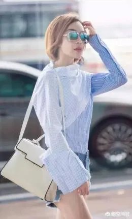 6月12日袁珊珊的机场搭配,条纹衬衫配短裤非常可爱,如何利用搭配穿出俏皮的感觉?